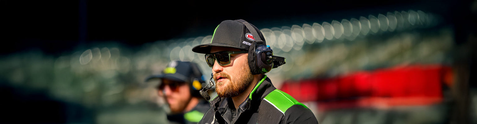 Complete racing communications kits with helmet wiring, crew chief radios, headsets, antennas, and harnesses