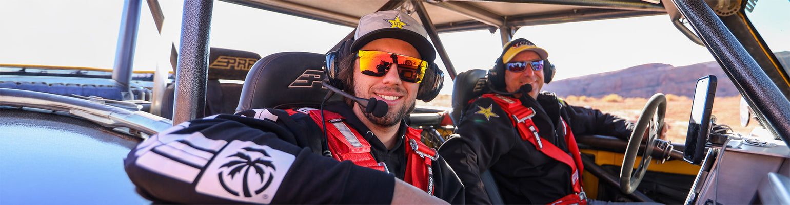 Rugged over‑the‑head and behind‑the‑head communication headsets and accessories for racing and industrial use